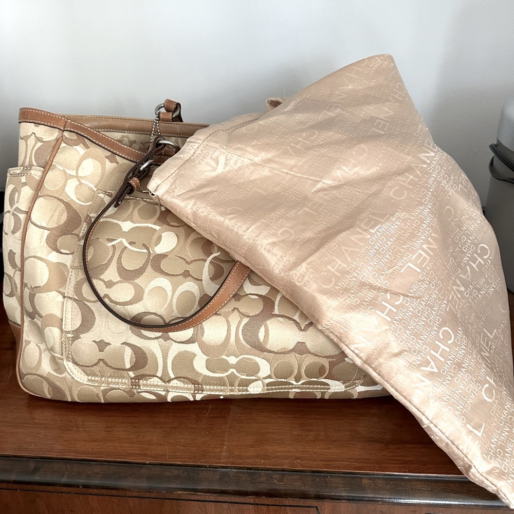 Large coach diaper bag.